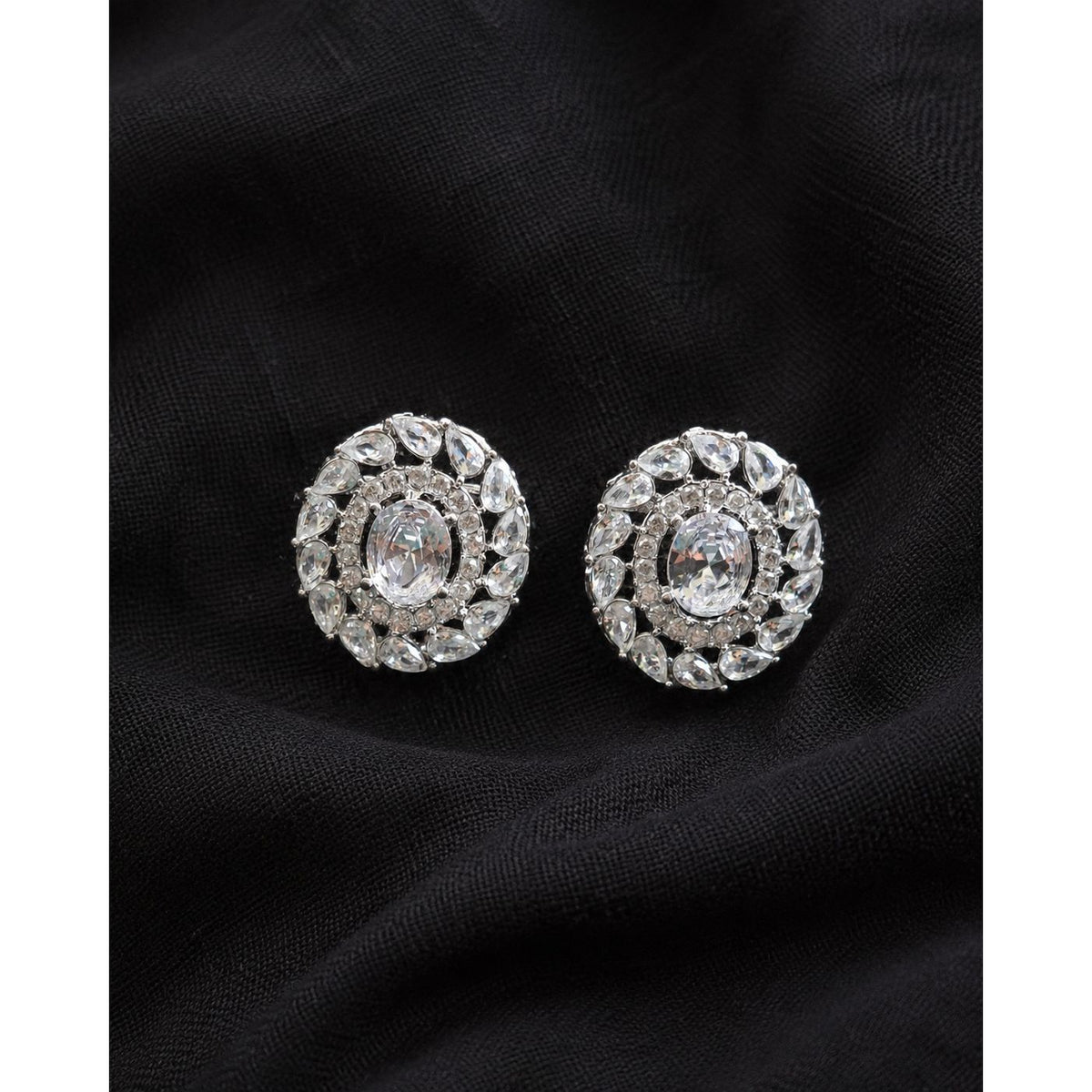 Regal Wreath Studs in silver-tone metal featuring an oval clear centre stone surrounded by clear zircon and a wreath of pear-cut stones.