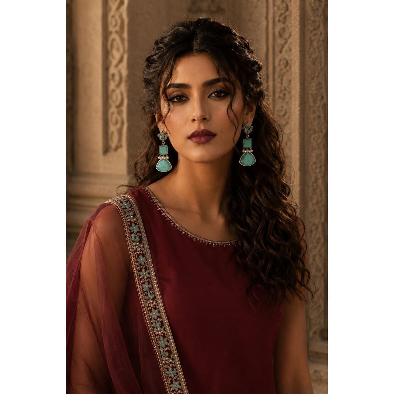 Model wearing Legacy Collection antique silver-tone mint green statement earrings with faceted stones and pearl accents.