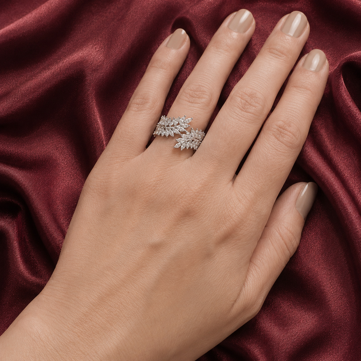 S925 silver Vela Wrap Band worn on hand, featuring layered marquise-cut clear stones in an open leaf-inspired design.