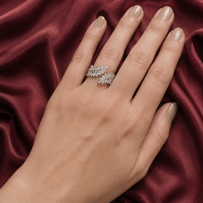 S925 silver Vela Wrap Band worn on hand, featuring layered marquise-cut clear stones in an open leaf-inspired design.