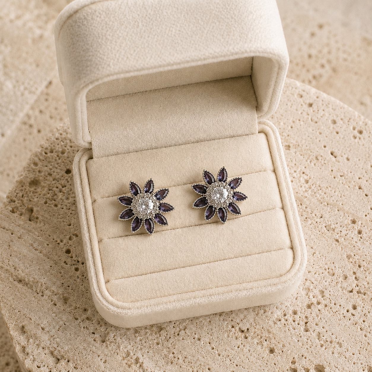 Smoky Midnight Blue floral crystal stud earrings with deep blue marquise petals and clear centre stones