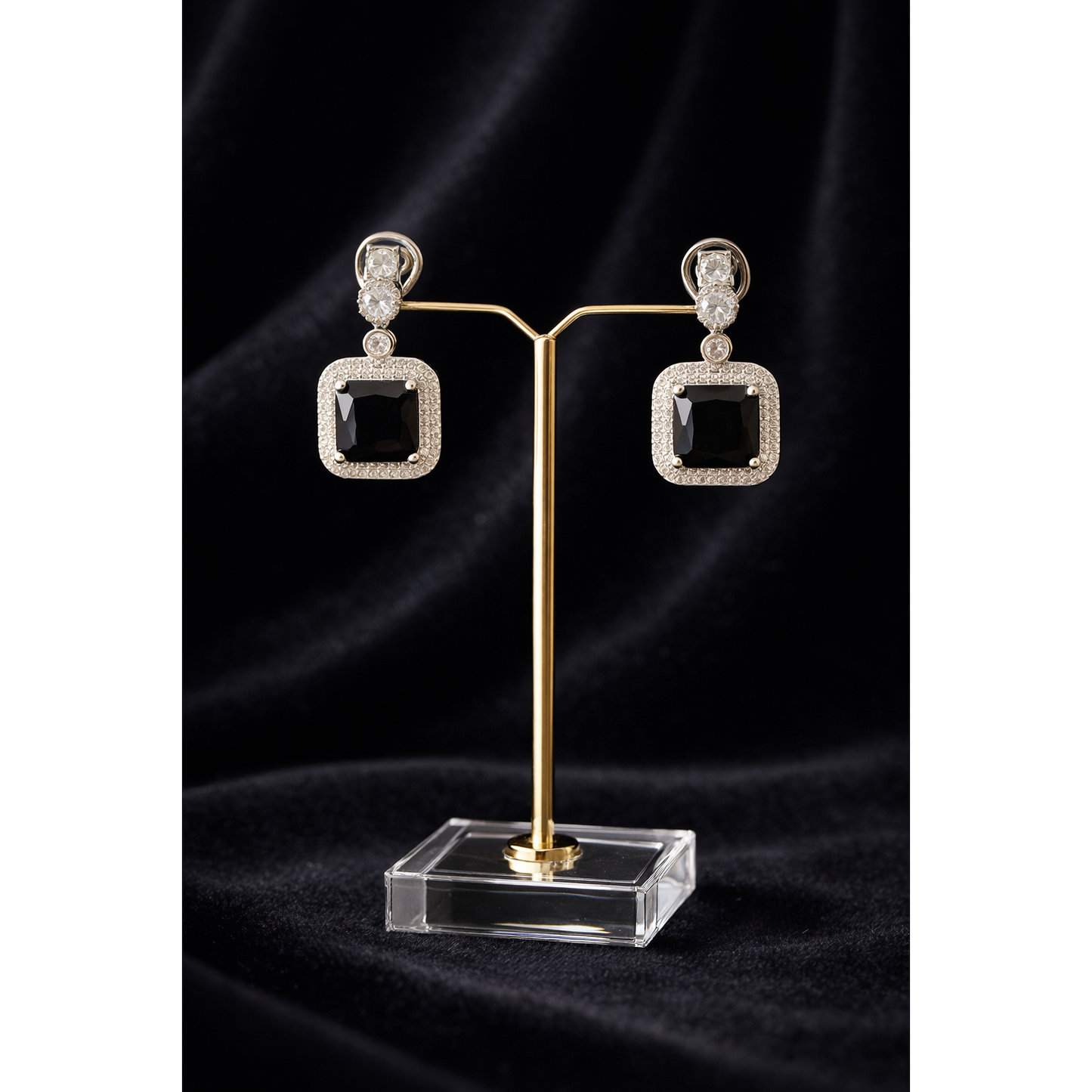 Silver black stone square drop earrings on stand, contemporary statement earrings, high-definition jewellery image