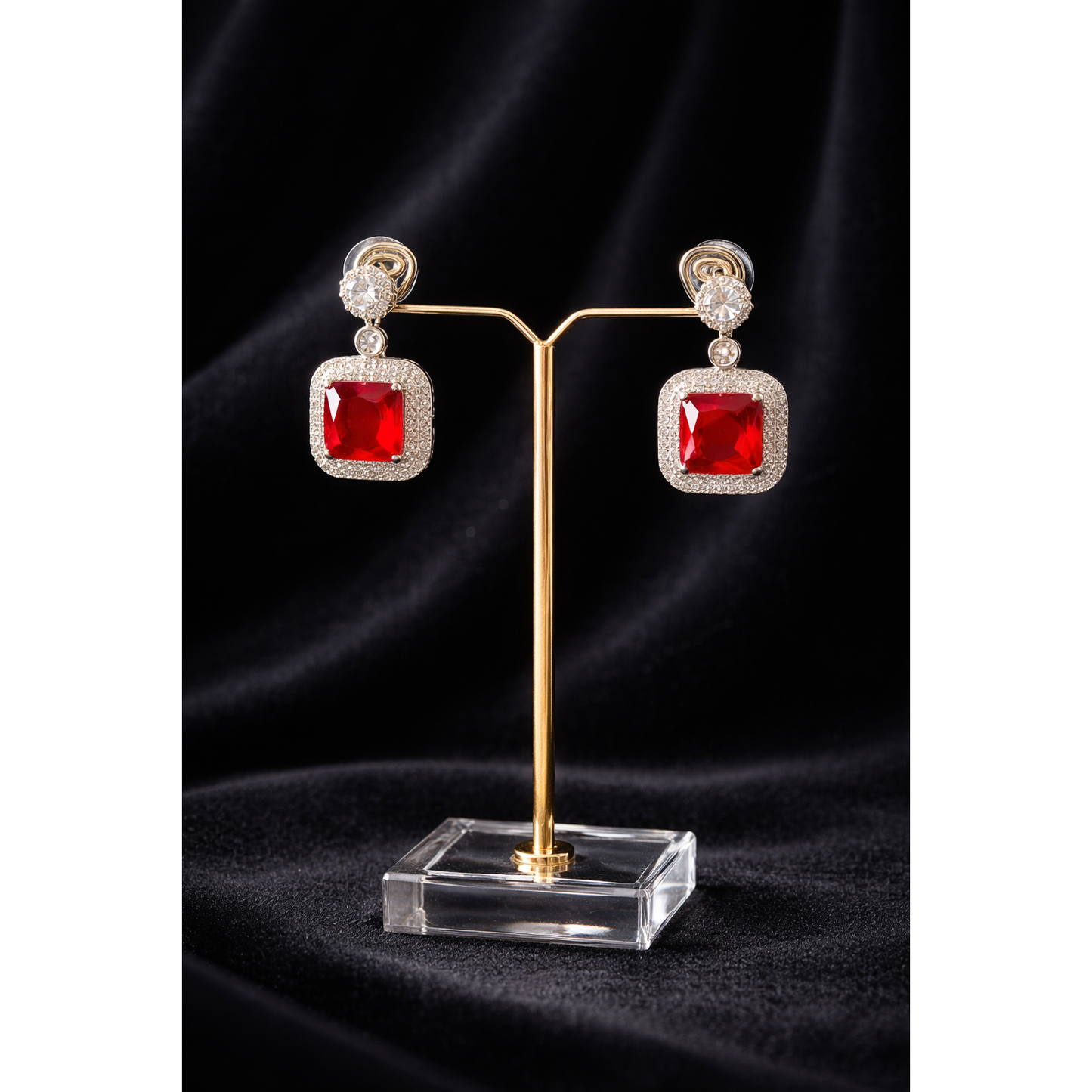 Silver square red gemstone earrings on stand, high-definition product display, modern drop design