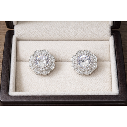 Silver floral halo clear crystal stud earrings displayed in premium cream jewellery box