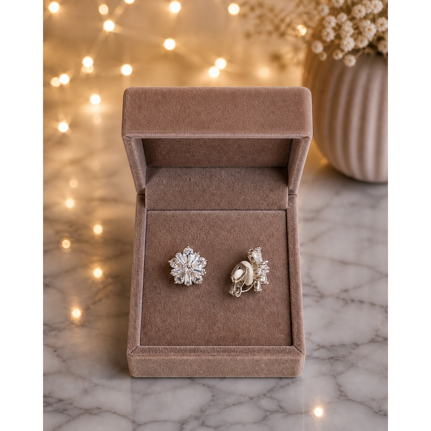 Back view of floral crystal clip-on stud earrings showing cushioned rubber pad and secure clip mechanism for non-pierced ears