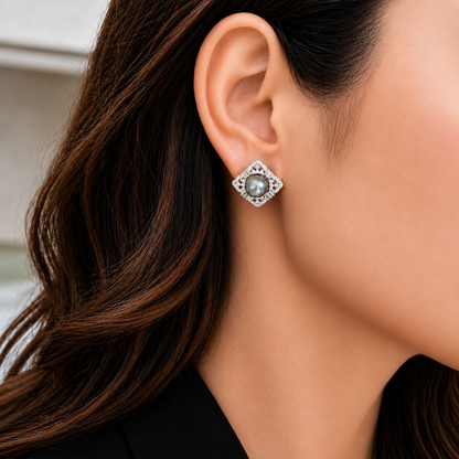 Close-up of Pearl Lattice Stud worn on the ear, featuring a luminous pearl centre surrounded by geometric silver and zircon detailing.