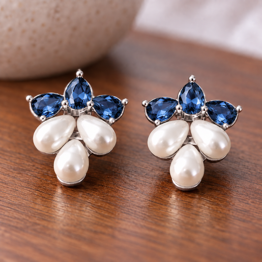 Pair of Grape  Dew Pearl Studs featuring three faceted  blue crystals above three ivory teardrop pearls in a silver-tone grape-bunch inspired design