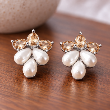Pair of Grape  Dew Pearl Studs featuring three faceted  champagne crystals above three ivory teardrop pearls in a silver-tone grape-bunch inspired design
