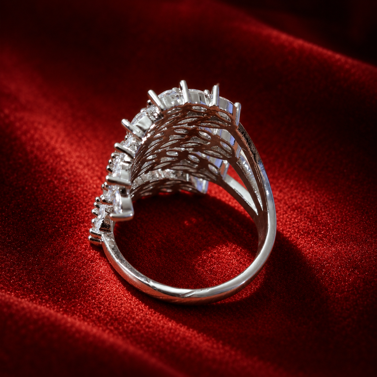 Back view of the S925 sterling silver Silver Laurel Statement Ring showing its polished band, raised stone settings and intricate openwork framework.