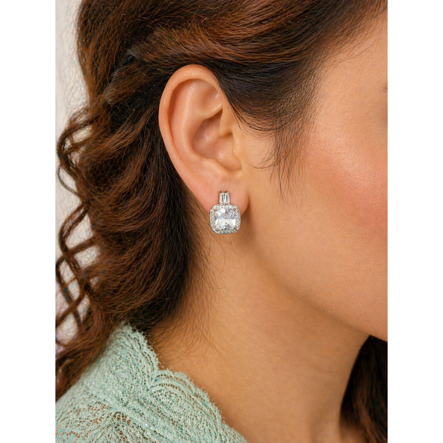 Square halo stud earrings with coloured gemstone worn on ear, silver tone crystal border elegant modern jewelry