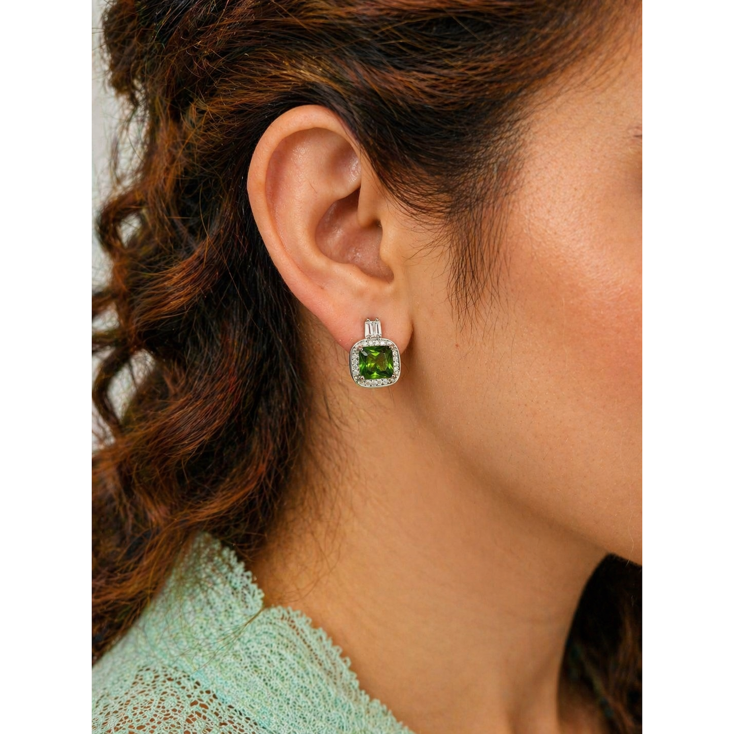 Square halo stud earrings with coloured gemstone worn on ear, silver tone crystal border elegant modern jewelry