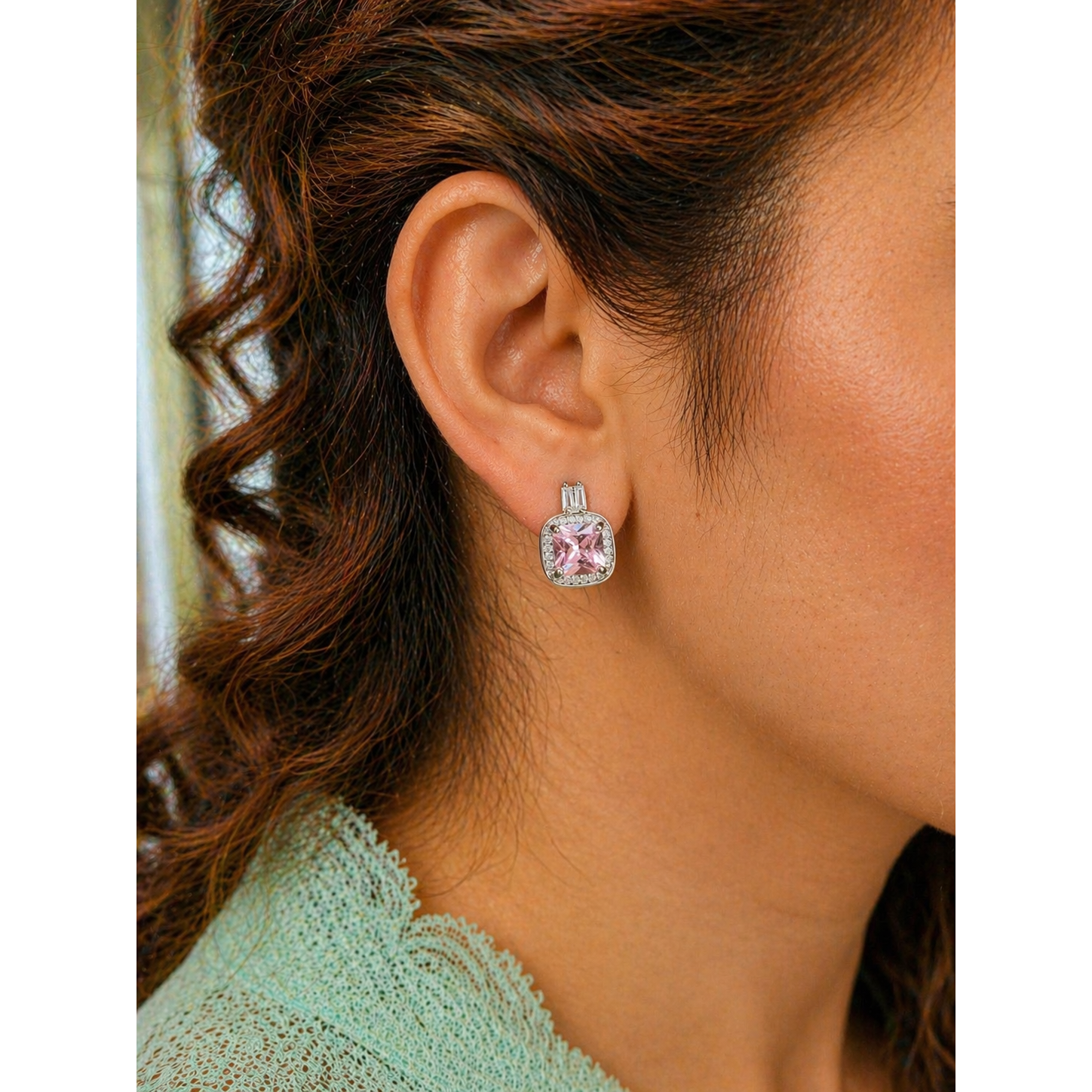 Square halo stud earrings with coloured gemstone worn on ear, silver tone crystal border elegant modern jewelry