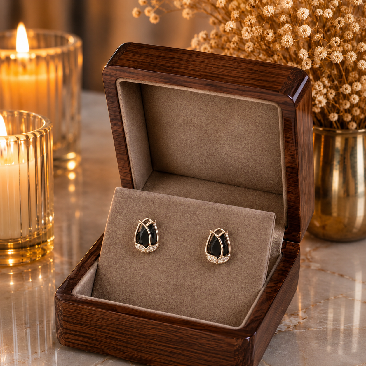 Tulip  black crystal stud earrings displayed in a premium velvet jewellery box with luxury wooden finish, candlelight ambience and dried floral décor