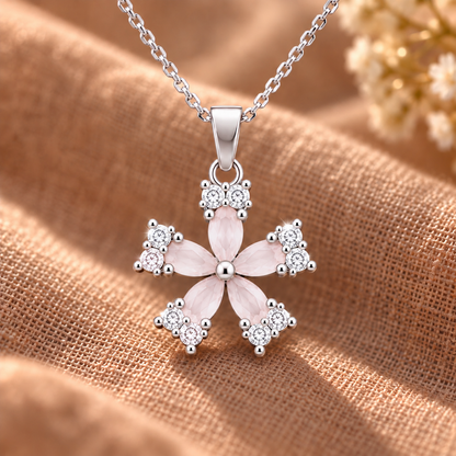 Fleur Quintet Locket with five soft pink marquise stones and clear zircon accents on a silver chain.