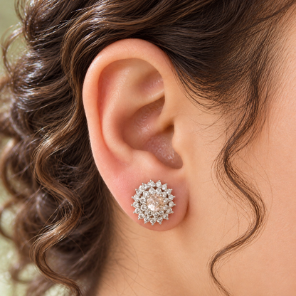 Close-up of a woman's ear wearing a champagne Kensington Cluster Stud, showcasing its delicate circular design and neat placement on the earlobe.
