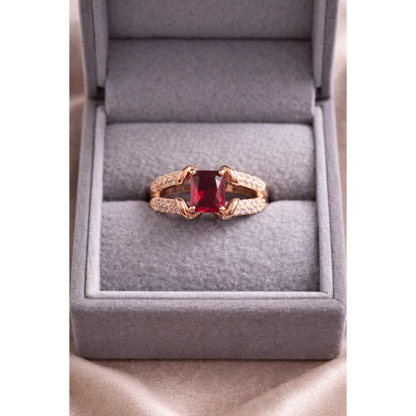 Gold red ring in a box