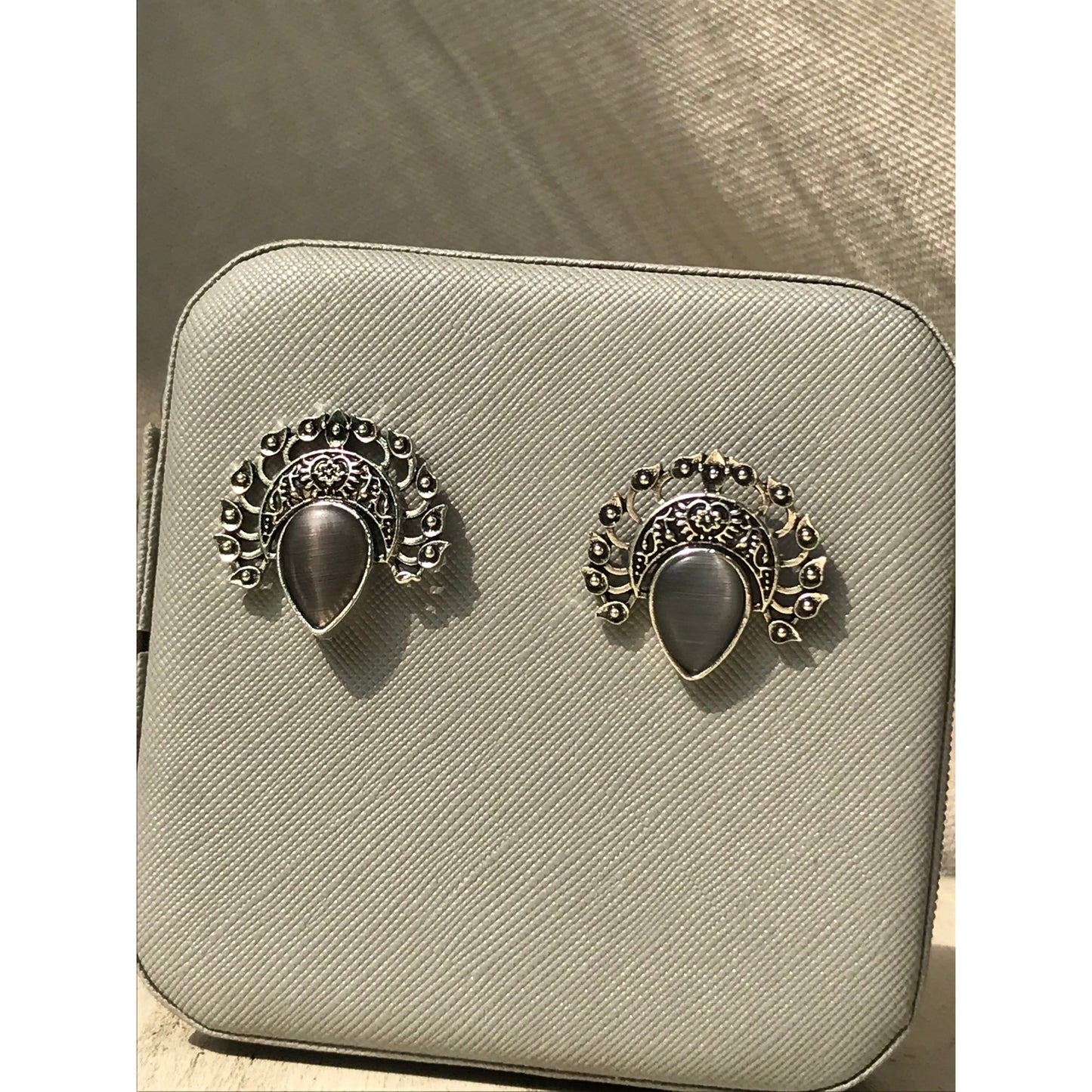 Silver Peacock Stud Earrings | Dark Stone Accents & Intricate Filigree