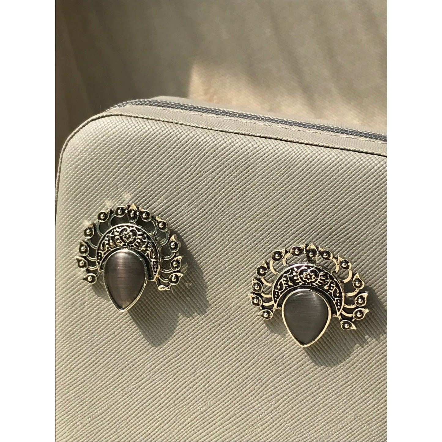 Silver Peacock Stud Earrings | Dark Stone Accents & Intricate Filigree