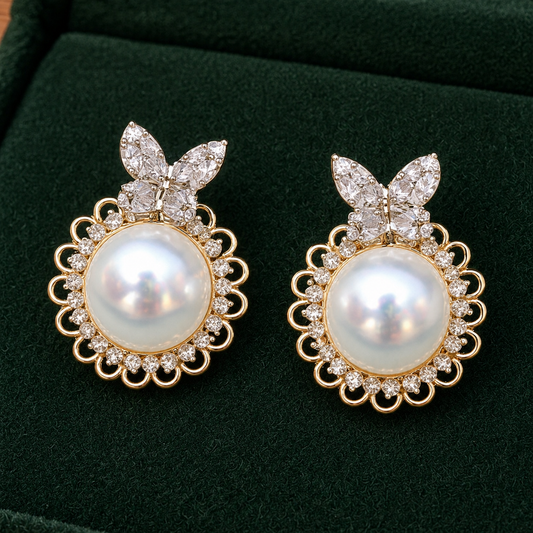 Pearlwing Studs with crystal butterfly motif, round pearl centre and scalloped detailing