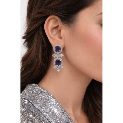 Woman wearing purple cushion-cut luxury statement drop earrings in silver-tone finish