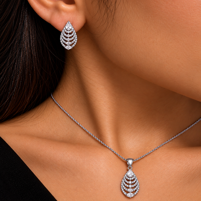 Model wearing the Cascade Leaf clear zircon pendant and matching earrings.