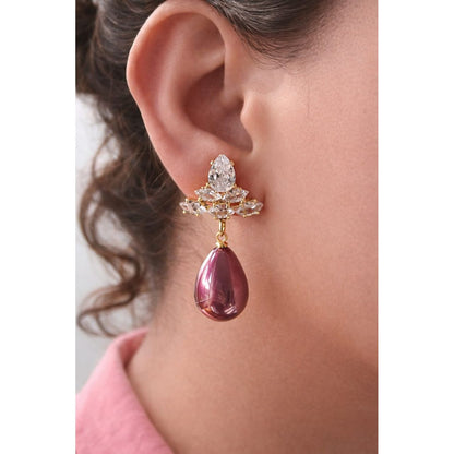 Plum rose teardrop crystal earrings worn on model with gold-tone crystal cluster, reflective finish