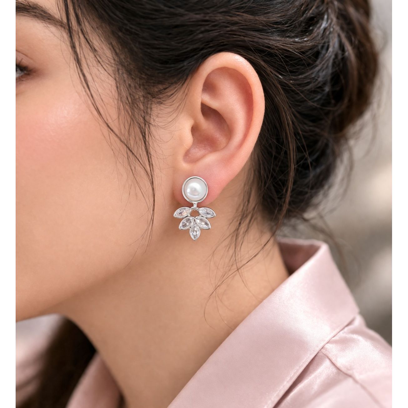 Silver pearl drop earrings with leaf design displayed in wooden velvet jewelry box 