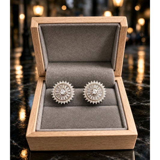 Silver round crystal stud earrings displayed in grey velvet wooden jewelry box