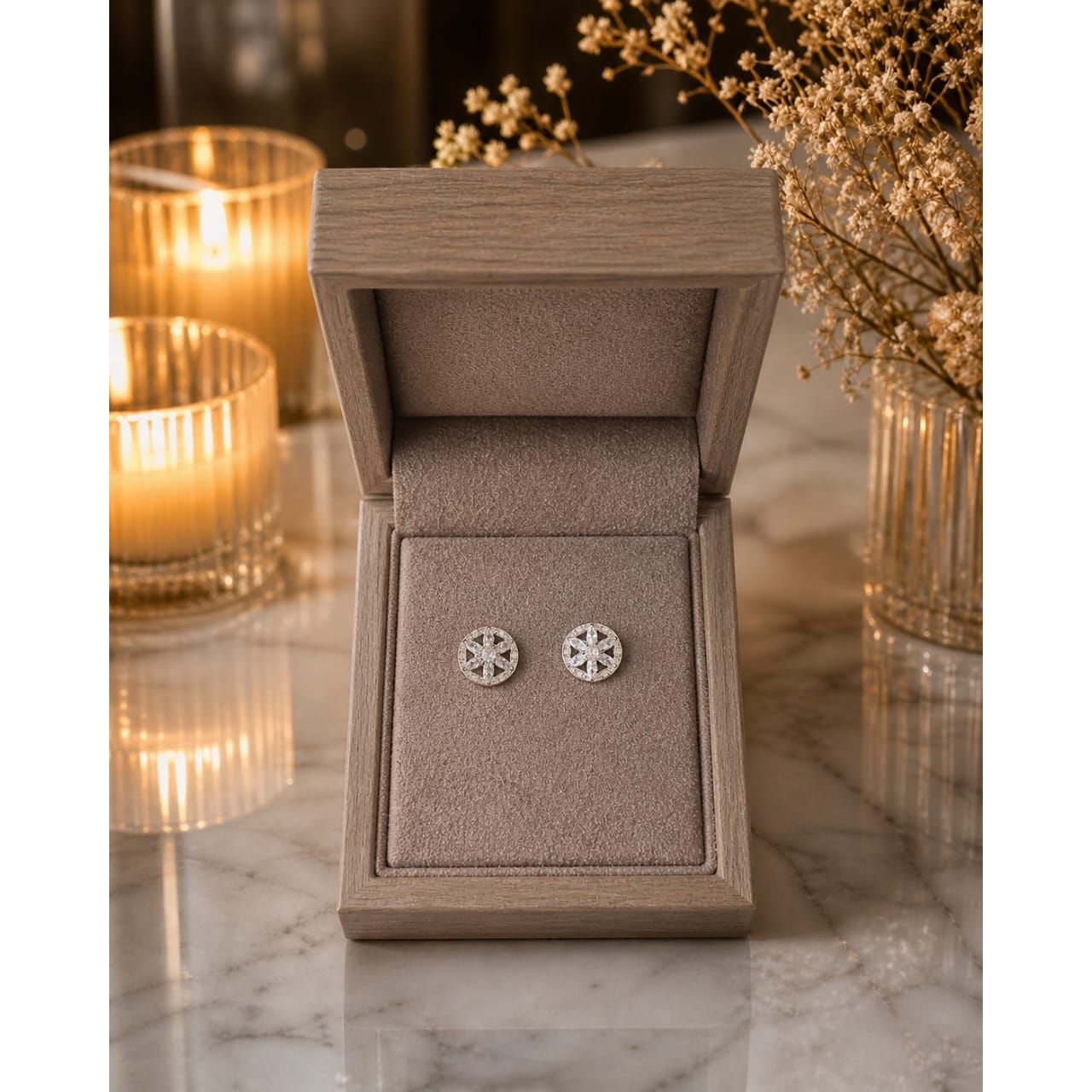 silver floral stone stud earrings displayed in a premium wooden jewelry box with taupe velvet lining