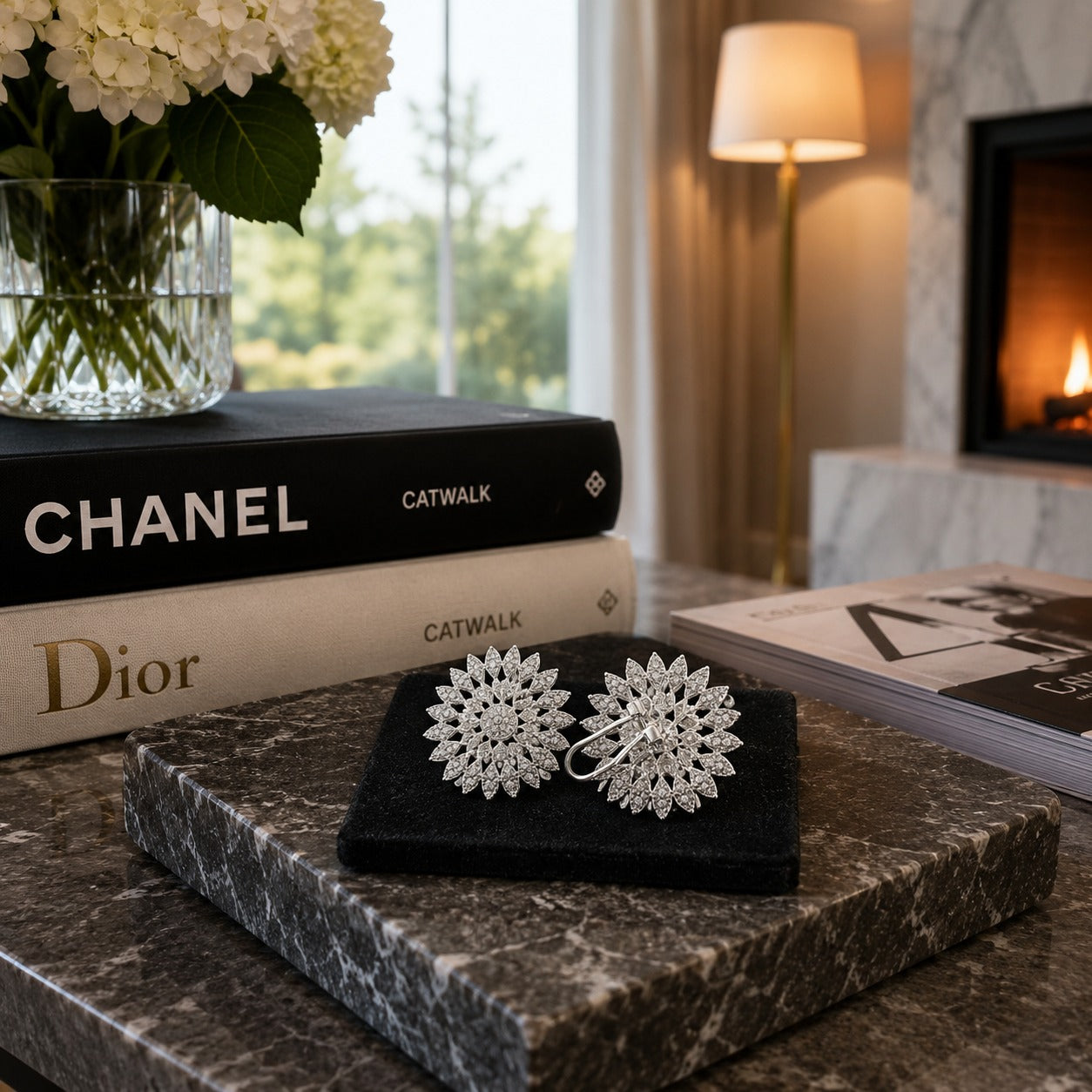 Back view of silver floral crystal leverback earrings showcasing the secure leverback latch closure on a premium black velvet display.