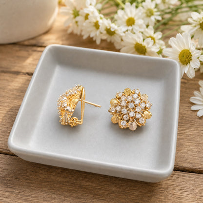 Side view of gold floral crystal stud earrings showing the secure clip-on comfort closure and layered floral design.