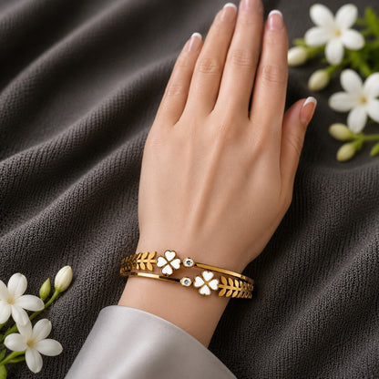 White clover magnetic bracelet worn on hand, designed for smaller wrists.