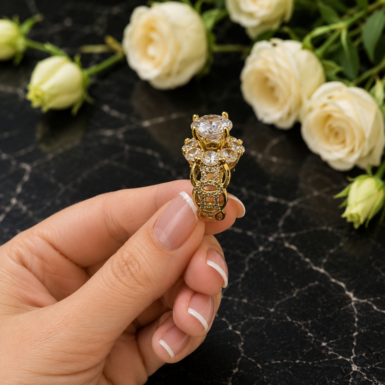 Side profile of the gold statement ring highlighting its intricate openwork band and crystal detailing.