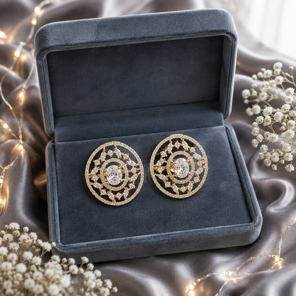 Solstice Studs with clear oval centre stone, marquise zircon accents and a sparkling gold-tone circular setting.