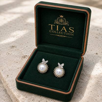 Pearlwing Studs with crystal butterfly motif, round pearl centre and scalloped detailing