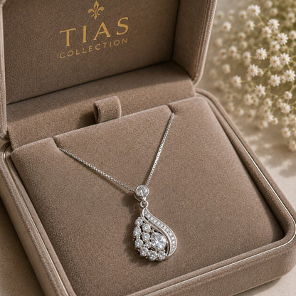 Lustre Arc silver-tone pendant necklace with clear crystal cluster and curved stone detailing