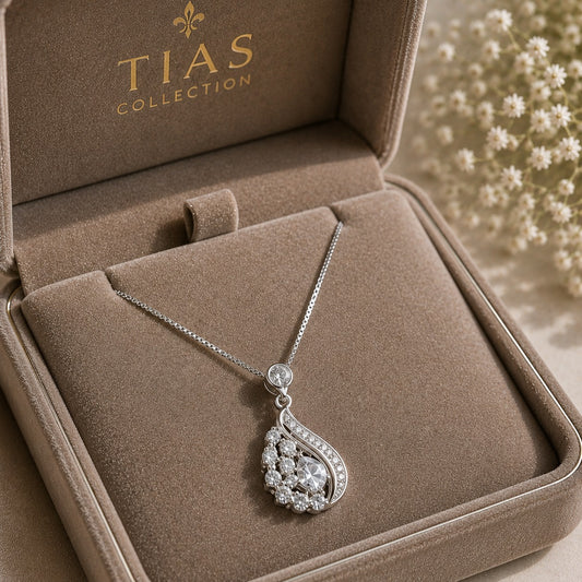 Lustre Arc silver-tone pendant necklace with clear crystal cluster and curved stone detailing