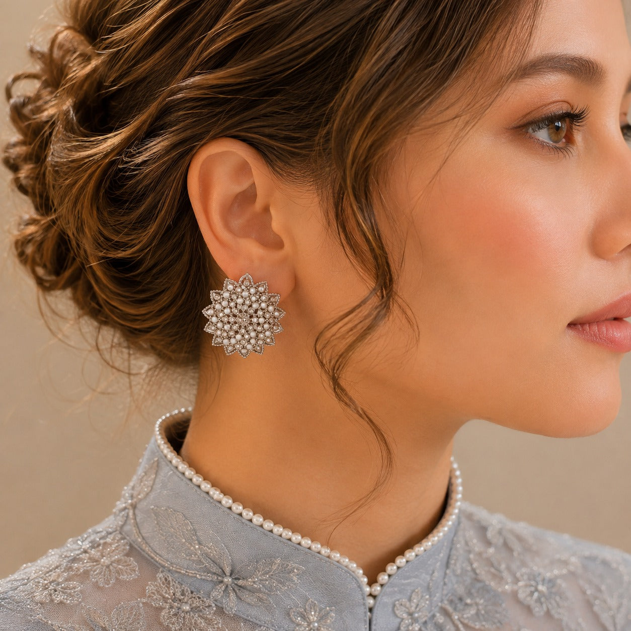 Model wearing silver-tone Pearl Mosaic Clips featuring layered pointed detailing, miniature pearls and clear sparkling stones.