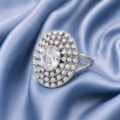 S925 Lucent Lace statement ring with oval clear centre stone and intricate crystal lattice design worn on hand.