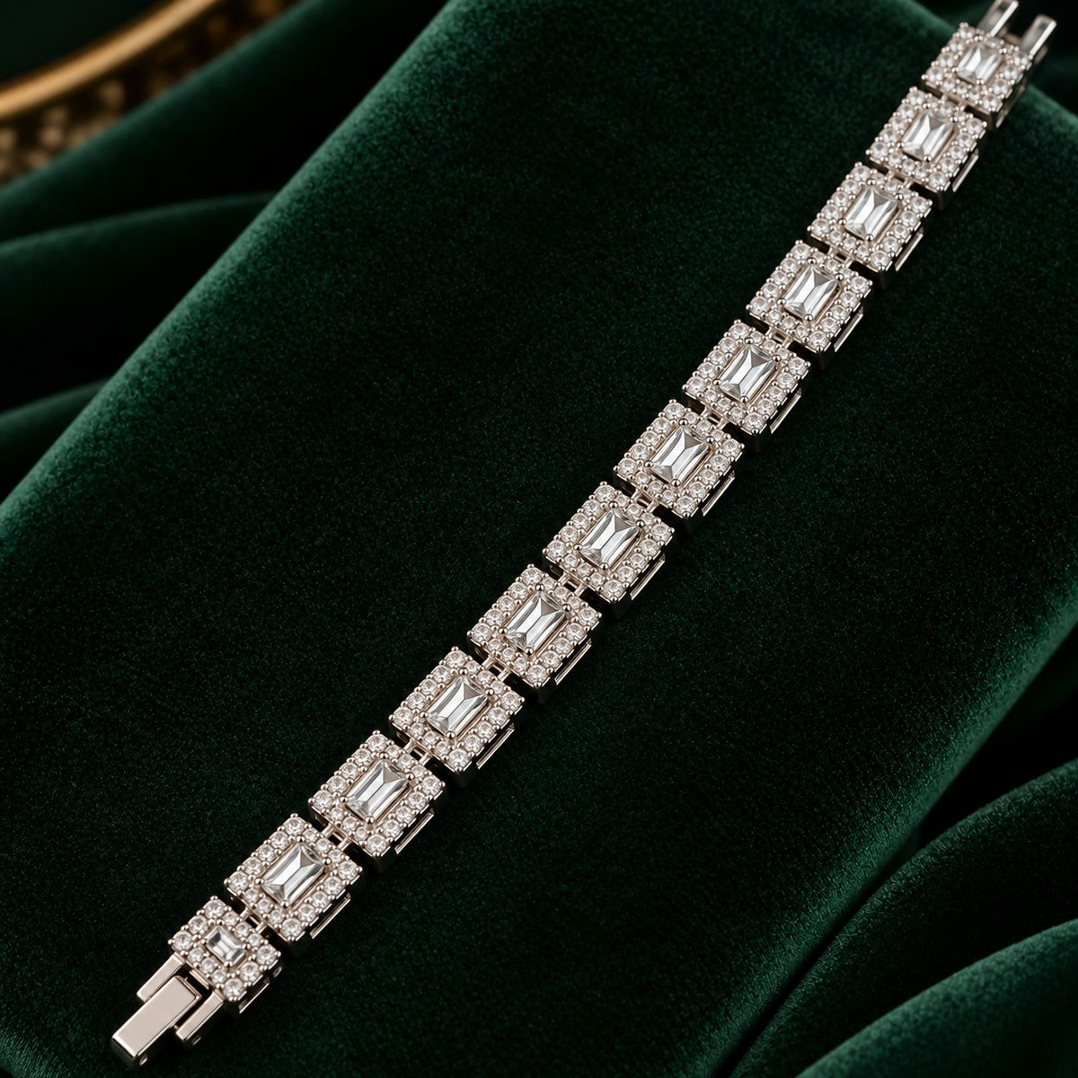 Close-up of the Framed Link Bracelet showing emerald-cut clear centre stones framed by rows of small clear zircon.