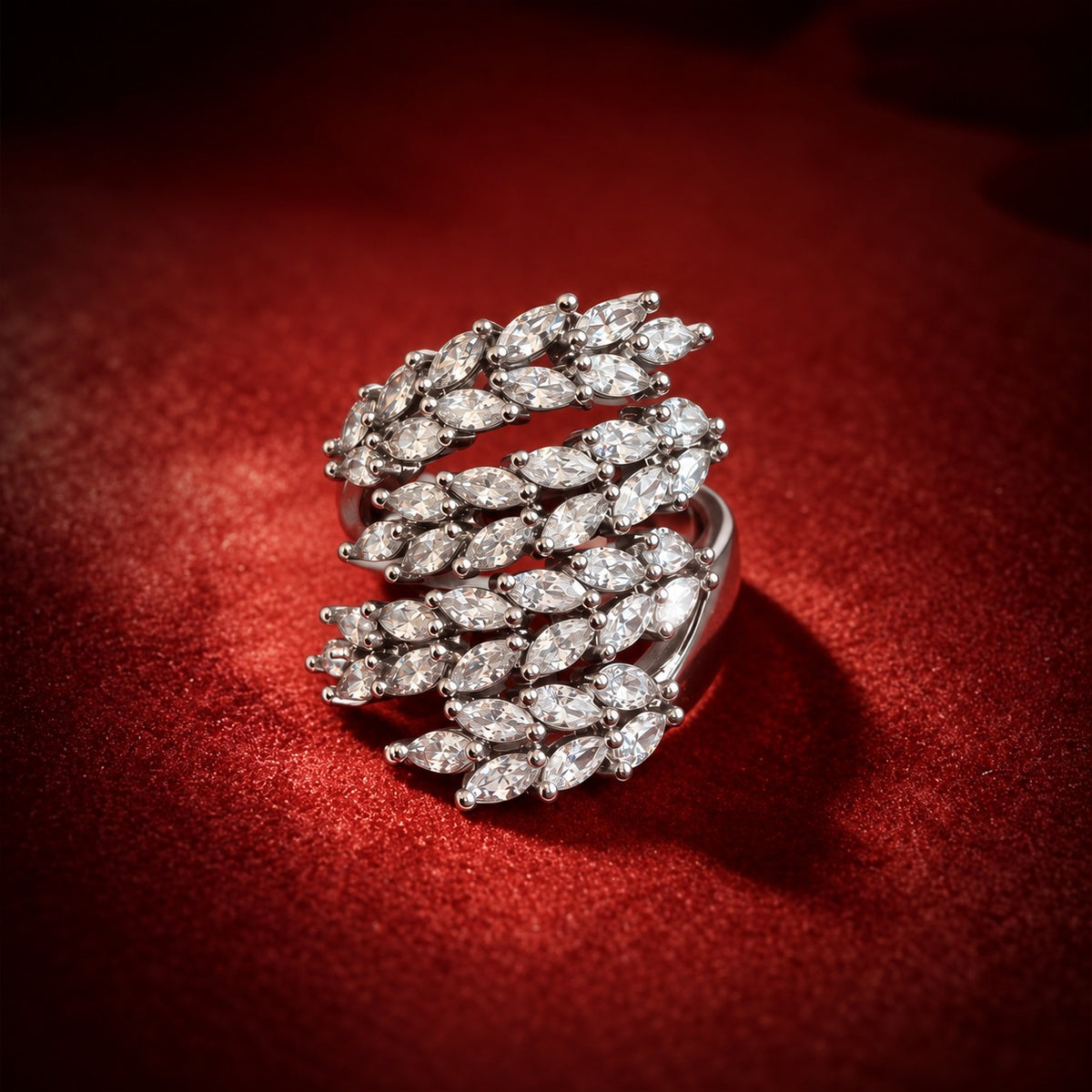 Front view of the S925 sterling silver statement ring featuring sweeping rows of individually set marquise-cut clear zircon arranged in a layered leaf-inspired design.