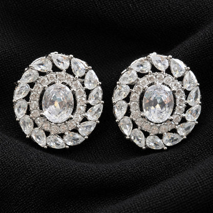 Detailed close-up of Regal Wreath Studs showing the oval  clear centre stone, inner zircon border and outer ring of pear-cut clear stones.