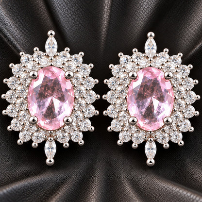 The Duchess Oval Studs with blush pink faceted centre stones, clear zircon surround and polished silver-tone setting