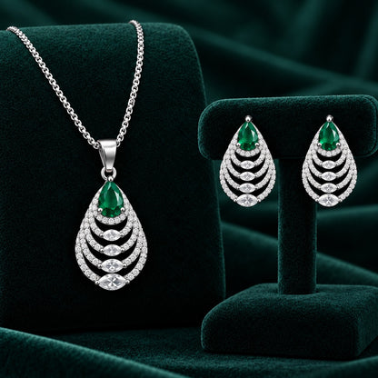 Cascade Leaf pendant and earrings with emerald green pear-cut stones and clear zircons.