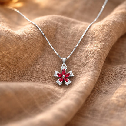 Fleur Quintet Locket with rich ruby-red marquise stones surrounded by clear zircon accents.