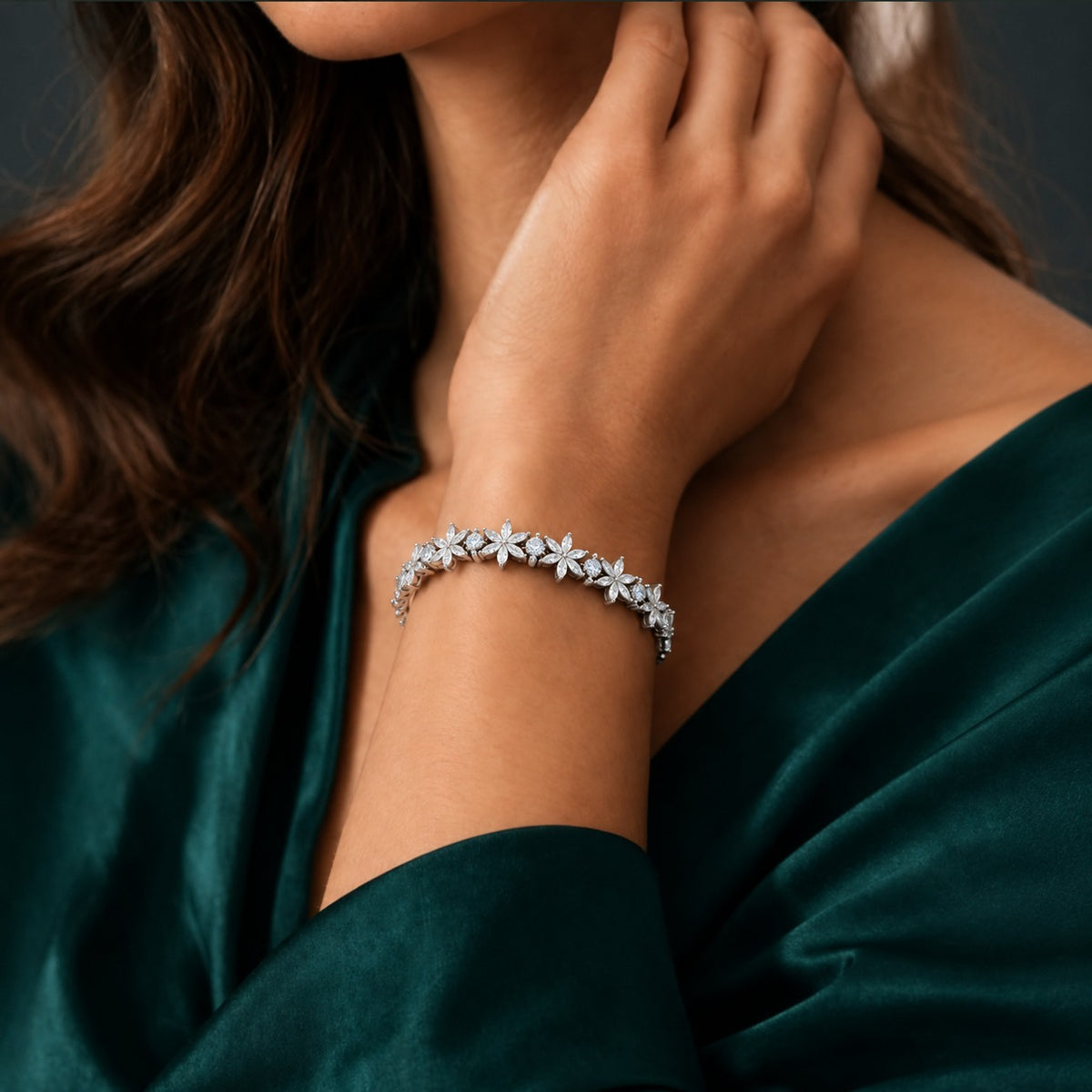 Silver Marquise Fleur Bracelet worn on the wrist, featuring a continuous floral arrangement of marquise and round clear zircon stones