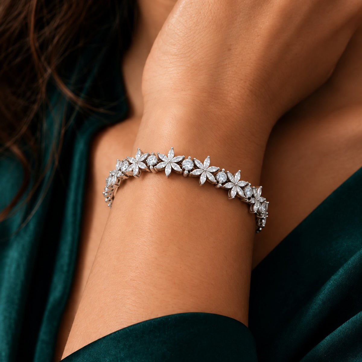 Silver Marquise Fleur Bracelet worn on the wrist, featuring a continuous floral arrangement of marquise and round clear zircon stones