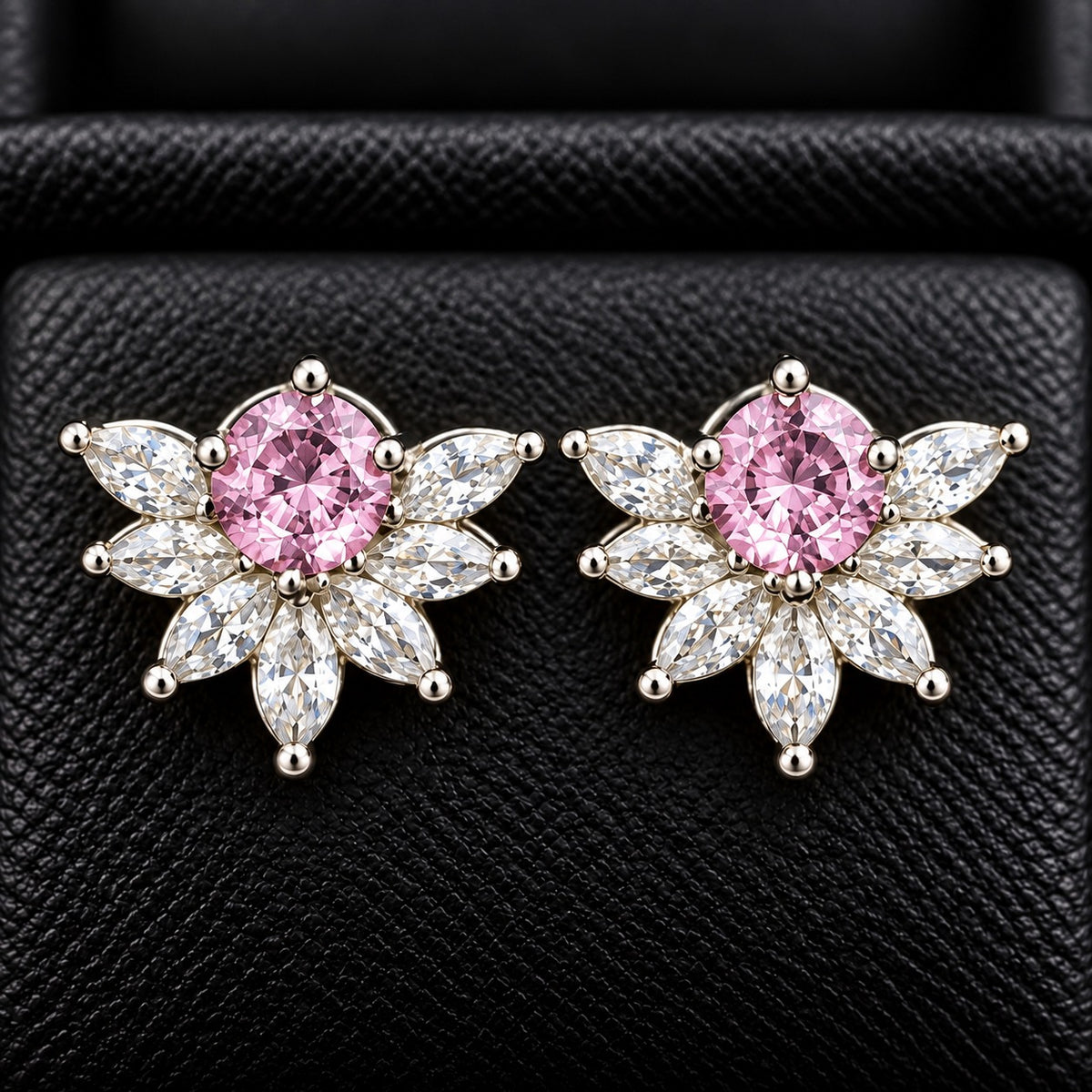 Trillium Gem Petal Studs with marquise clear zircon petals and round  blush pink centre gemstone in silver-tone setting.