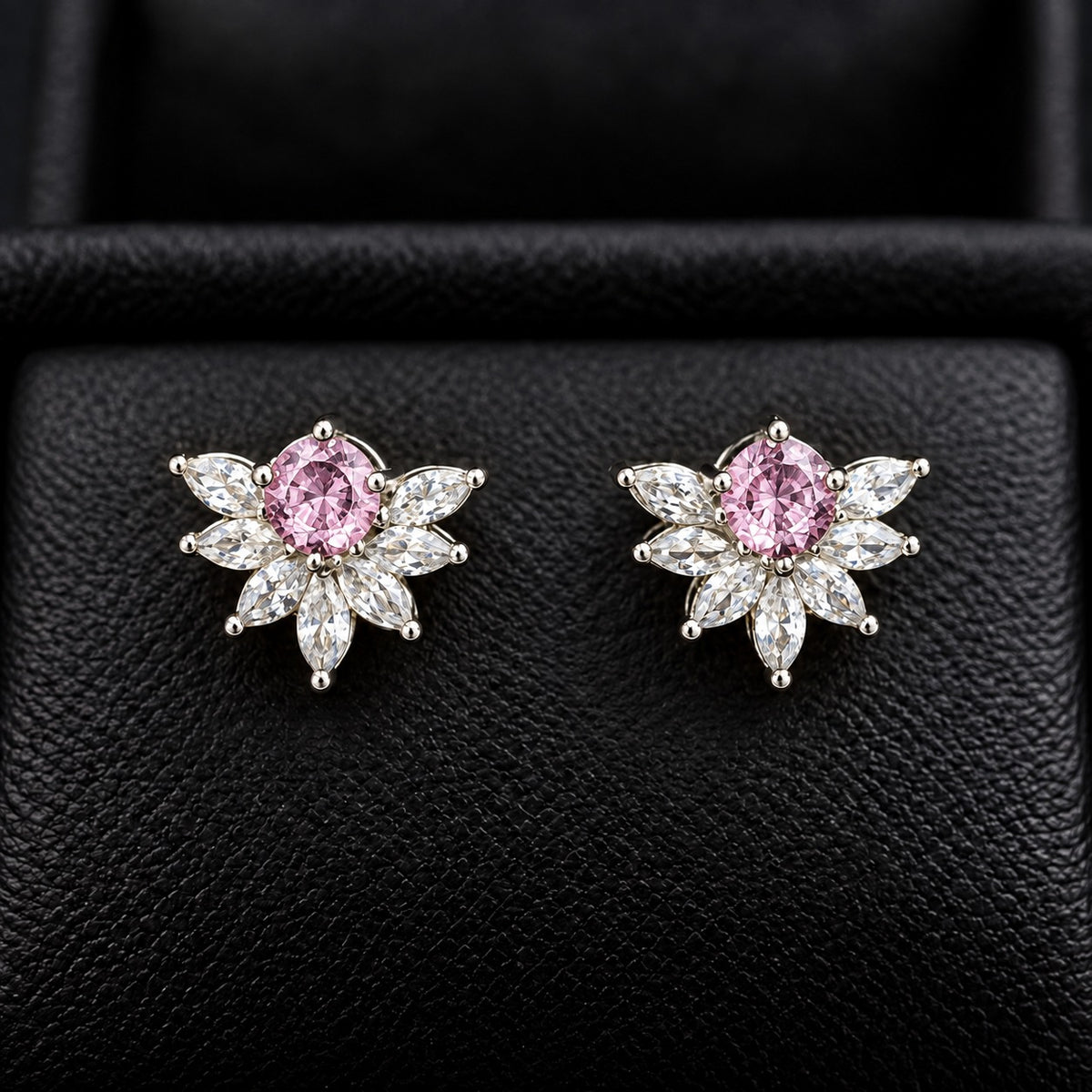 Trillium Gem Petal Studs with marquise clear zircon petals and round  blush pink centre gemstone in silver-tone setting.