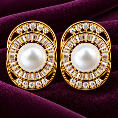 Detailed view of Pearl Meridian Studs showing the polished oval framework, pearl centre and clear zircon arrangement.